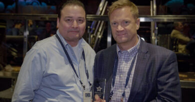 Alex Gata (l) and Stephen Green accept SPI award for “Best Business Product.”