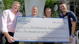 from L to R: John Cassell, Asset Manager for Margaritaville Beach House Key West/DiamondRock Hospitality; Tom Healy, Chief Operating Officer/DiamondRock Hospitality; Bailey Thomasson, Restoration Project Coordinator/Coral Restoration Foundation™; Jeremy DaSilva, General Manager/Margaritaville Beach House Key West)