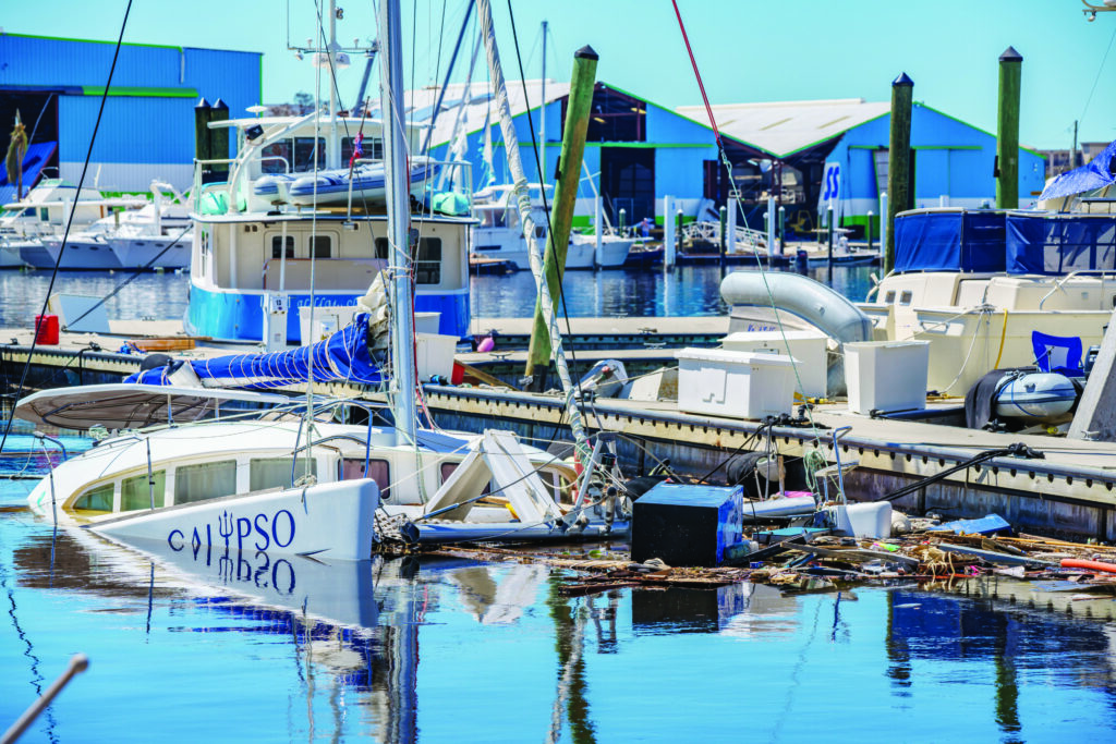 Fort Myers, FL, USA - October 1, 2022: Sunken boats in Fort Myers FL after Hurricane Ian