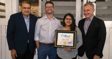 From Left to Right: Nigel Lobo, Bryan Boyd, and David Brown honor Odalys Joaquin’s graduation from the BE EPIC Trailblazer leadership development program.