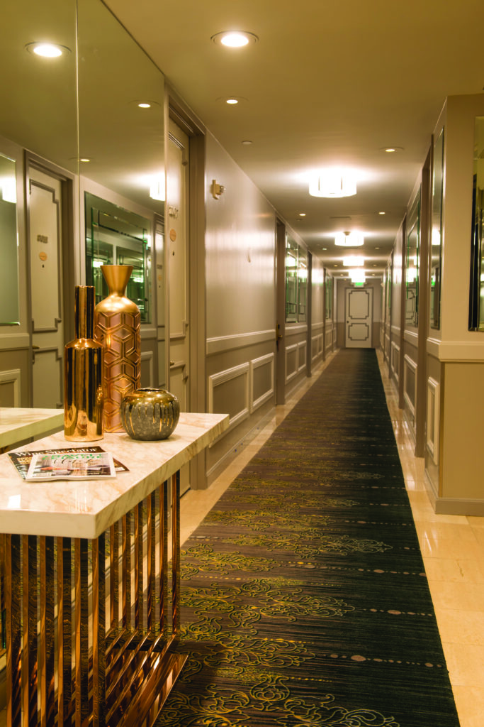 Hallway in San Francisco’s 39-year-old Donatello Resort remains current through frequent renovations