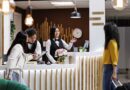 Management Companies: You’ve Come a Long Way, Baby! receptionist provides guest help